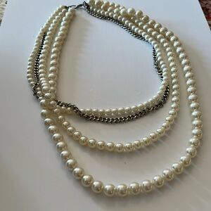 Vintage 4 strand pearl necklace with silver toned chain accent. 15”
